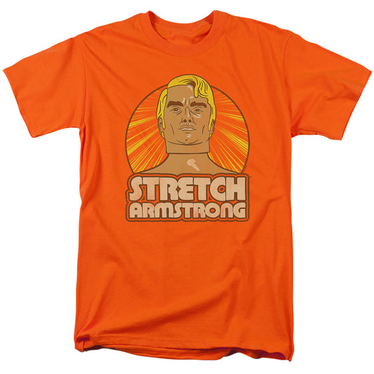 STRETCH ARMSTRONG : ARMSTRONG BADGE S\S ADULT 18\1 Orange 2X